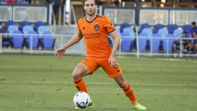Jul 17, 2022; San Jose, California, USA; Houston Dynamo defender Adam Lundqvist (3) controls the ball against the San Jose Earthquakes during the first half at PayPal Park. Mandatory Credit: Kelley L Cox-USA TODAY Sports