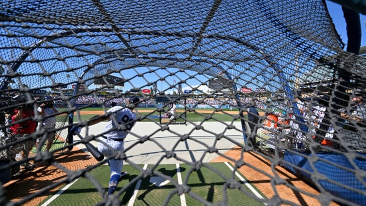 Jul 18, 2022; Los Angeles, CA, USA;  New York Yankees center fielder Aaron Judge (99) takes swings in the cage during All Star-Batting Practice at Dodger Stadium. Mandatory Credit: Jayne Kamin-Oncea-USA TODAY Sports