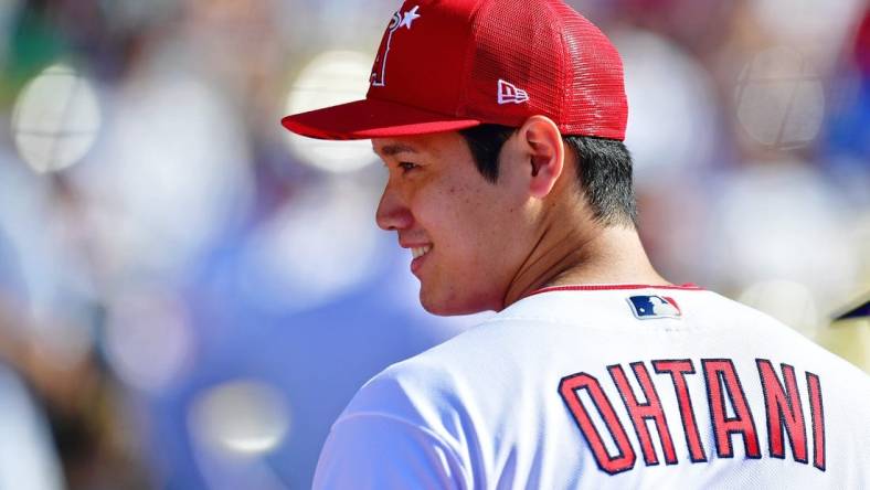 Jul 18, 2022; Los Angeles, CA, USA; Los Angeles Angels pitcher/designated hitter Shohei Ohtani (17) looks on before the 2022 Home Run Derby at Dodgers Stadium. Mandatory Credit: Gary Vasquez-USA TODAY Sports