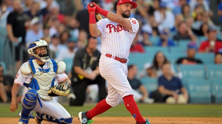 Jul 18, 2022; Los Angeles, CA, USA; Philadelphia Phillies left fielder Kyle Schwarber (12) hits in the first round during the 2022 Home Run Derby at Dodgers Stadium. Mandatory Credit: Jayne Kamin-Oncea-USA TODAY Sports