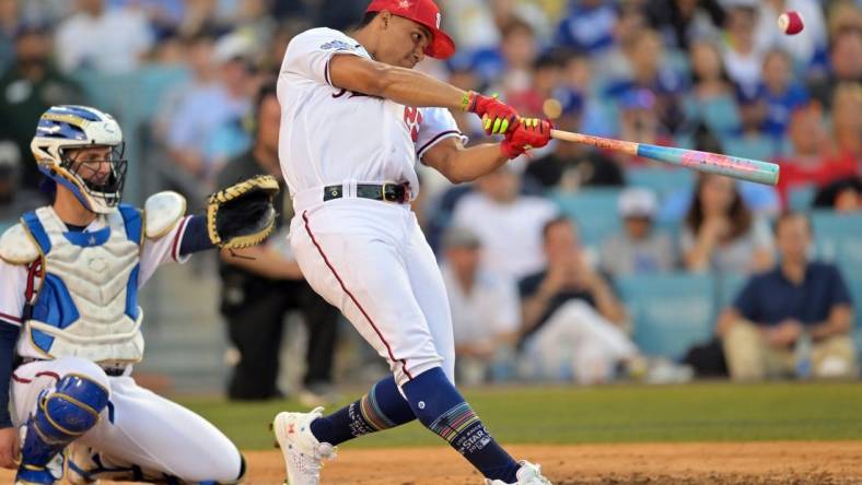 Jul 18, 2022; Los Angeles, CA, USA; Washington Nationals right fielder Juan Soto (22) hits in the final round during the 2022 Home Run Derby at Dodgers Stadium. Mandatory Credit: Jayne Kamin-Oncea-USA TODAY Sports