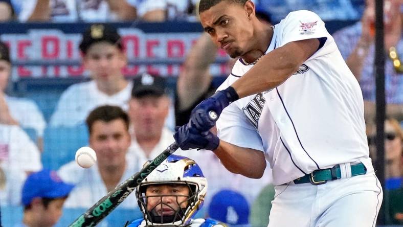 Jul 18, 2022; Los Angeles, CA, USA; Seattle Mariners center fielder Julio Rodriguez (44) hits in the final round during the 2022 Home Run Derby at Dodgers Stadium. Mandatory Credit: Robert Hanashiro-USA TODAY Sports