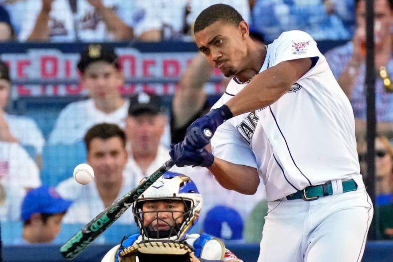 Jul 18, 2022; Los Angeles, CA, USA; Seattle Mariners center fielder Julio Rodriguez (44) hits in the final round during the 2022 Home Run Derby at Dodgers Stadium. Mandatory Credit: Robert Hanashiro-USA TODAY Sports