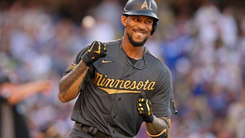 Jul 19, 2022; Los Angeles, California, USA; American League outfielder Byron Buxton (25) of the Minnesota Twins reacts after hitting a home run against the National League during the fourth inning of the 2022 MLB All Star Game at Dodger Stadium. Mandatory Credit: Jayne Kamin-Oncea-USA TODAY Sports