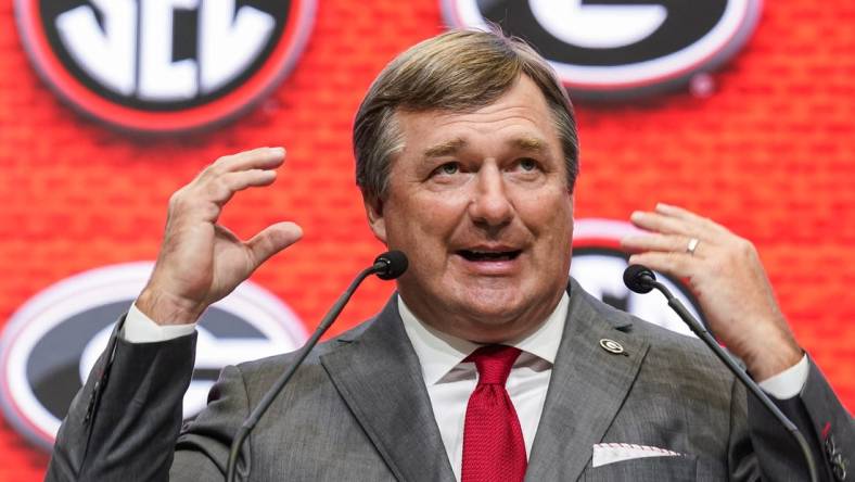 Jul 20, 2022; Atlanta, GA, USA; Georgia Bulldogs head coach Kirby Smart talks to the media during SEC Media Days at the College Football Hall of Fame. Mandatory Credit: Dale Zanine-USA TODAY Sports