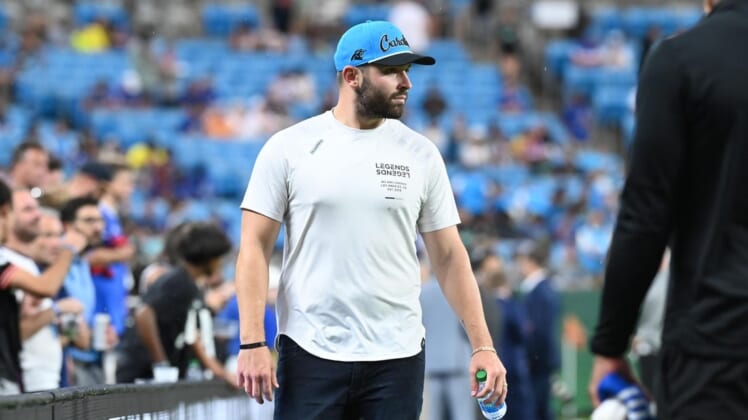 Jul 20, 2022; Charlotte, North Carolina, USA; Carolina Panthers quarterback Baker Mayfield looks on before the game between Charlotte FC and Chelsea FC at Bank of America Stadium. at Bank of America Stadium. Mandatory Credit: Griffin Zetterberg-USA TODAY Sports