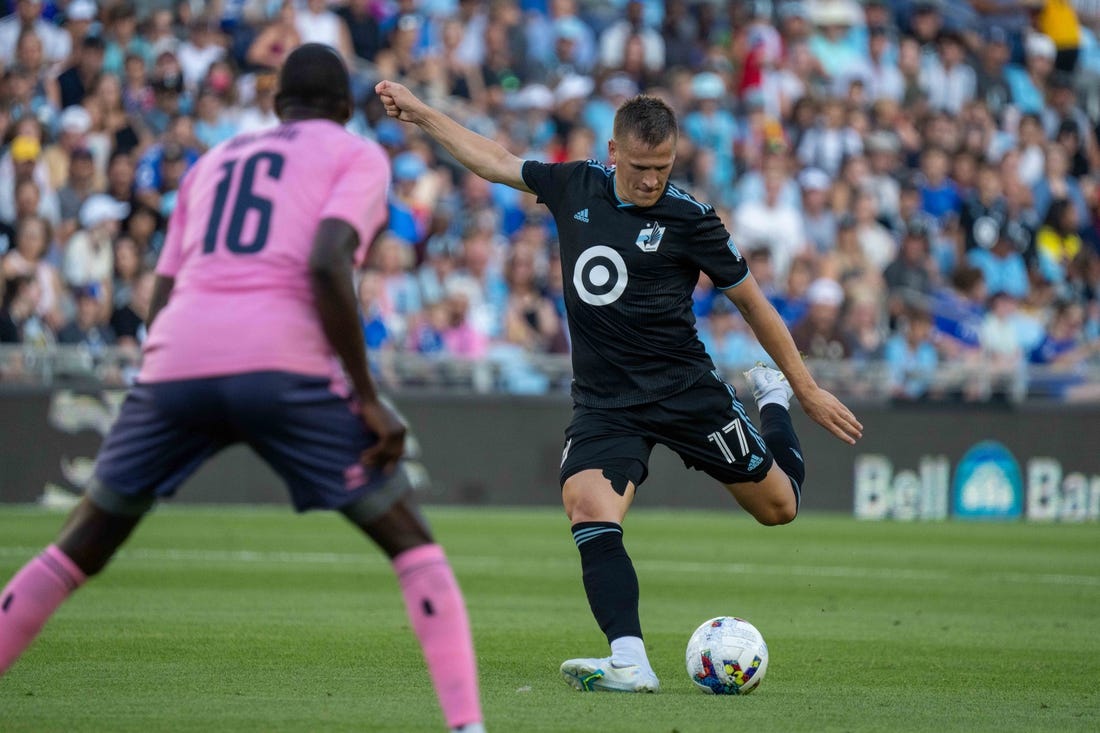 Jul 20, 2022; Minneapolis, MN, USA; Minnesota United midfielder Robin Lod (17) shoots as Everton midfielder Abdoulaye Doucoure (16) defends in the first half at Allianz Field. Mandatory Credit: Matt Blewett-USA TODAY Sports