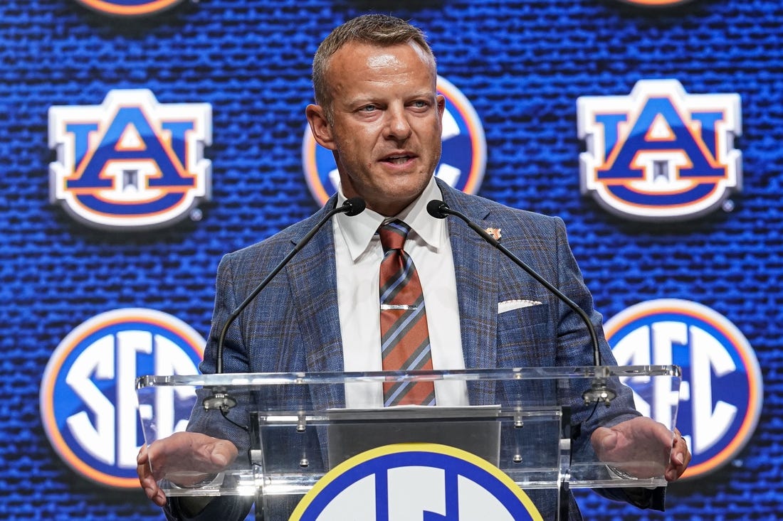 Jul 21, 2022; Atlanta, GA, USA; Auburn Tigers head coach Bryan Harsin shown on the stage during SEC Media Days at the College Football Hall of Fame. Mandatory Credit: Dale Zanine-USA TODAY Sports