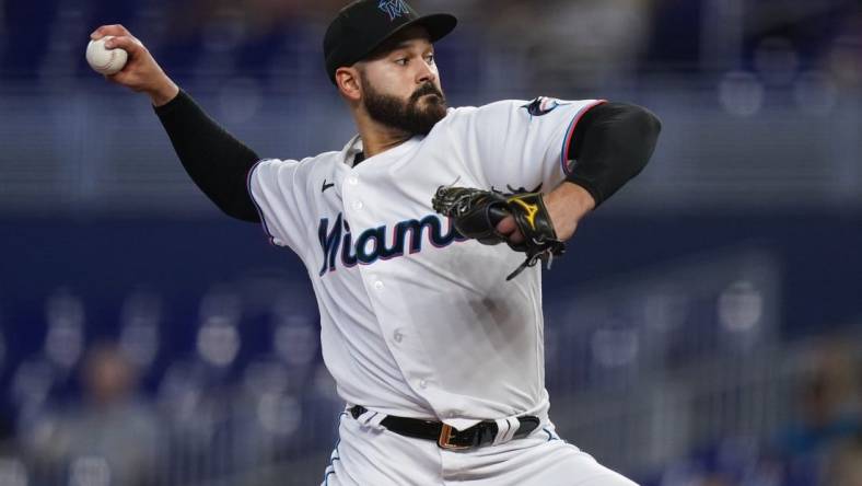 Jul 21, 2022; Miami, Florida, USA; Miami Marlins starting pitcher Pablo Lopez (49) delivers a pitch in the first inning against the Texas Rangers at loanDepot park. Mandatory Credit: Jasen Vinlove-USA TODAY Sports