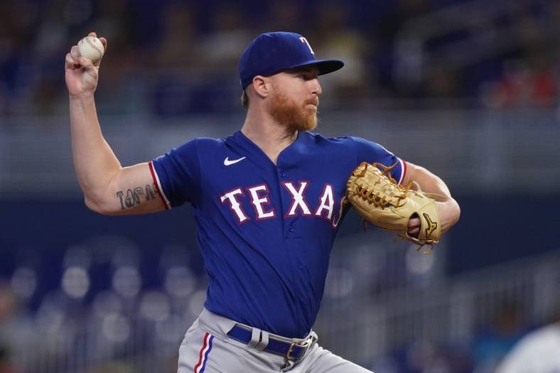 Jul 21, 2022; Miami, Florida, USA; Texas Rangers starting pitcher Jon Gray (22) delivers a pitch in the first inning against the Miami Marlins at loanDepot park. Mandatory Credit: Jasen Vinlove-USA TODAY Sports