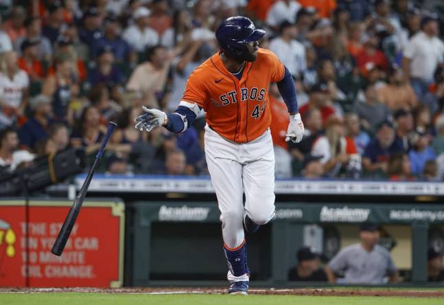 Houston Astros designated hitter Yordan Alvarez (44) hits a two