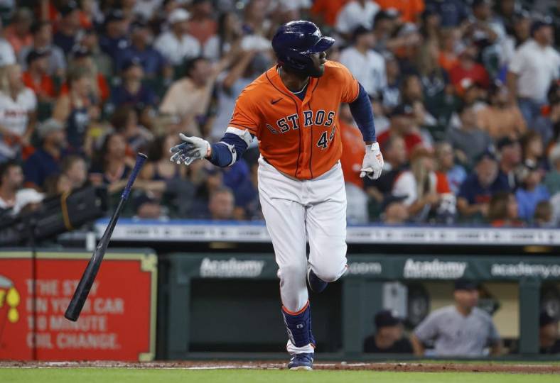 Jul 21, 2022; Houston, Texas, USA; Houston Astros designated hitter Yordan Alvarez (44) hits a home run during the first inning against the New York Yankees at Minute Maid Park. Mandatory Credit: Troy Taormina-USA TODAY Sports