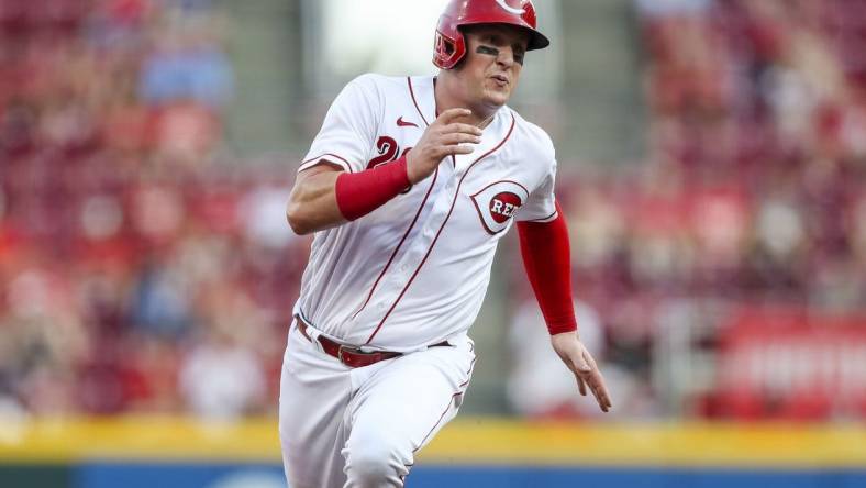 Jul 22, 2022; Cincinnati, Ohio, USA; Cincinnati Reds catcher Michael Papierski (26) runs to third on a double hit by shortstop Kyle Farmer (not pictured) in the second inning against the St. Louis Cardinals at Great American Ball Park. Mandatory Credit: Katie Stratman-USA TODAY Sports