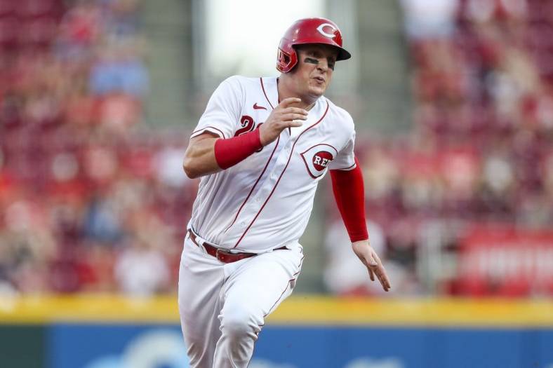 Jul 22, 2022; Cincinnati, Ohio, USA; Cincinnati Reds catcher Michael Papierski (26) runs to third on a double hit by shortstop Kyle Farmer (not pictured) in the second inning against the St. Louis Cardinals at Great American Ball Park. Mandatory Credit: Katie Stratman-USA TODAY Sports