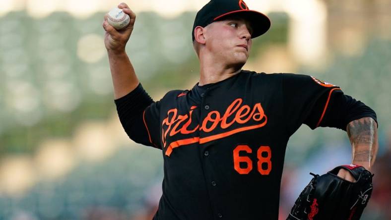 Jul 22, 2022; Baltimore, Maryland, USA;  Baltimore Orioles starting pitcher Tyler Wells (68) throws a first inning pitch against the New York Yankees at Oriole Park at Camden Yards. Mandatory Credit: Tommy Gilligan-USA TODAY Sports