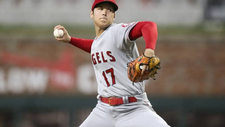 Jul 22, 2022; Atlanta, Georgia, USA; Los Angeles Angels starting pitcher Shohei Ohtani (17) throws against the Atlanta Braves in the second inning at Truist Park. Mandatory Credit: Brett Davis-USA TODAY Sports