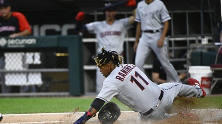Jul 22, 2022; Chicago, Illinois, USA;  Cleveland Guardians third baseman Jose Ramirez (11) scores against the Chicago White Sox during the first inning at Guaranteed Rate Field. Mandatory Credit: Matt Marton-USA TODAY Sports