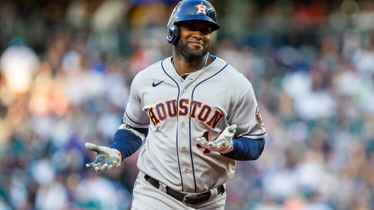 Jul 22, 2022; Seattle, Washington, USA;  Houston Astros designated hitter Yordan Alvarez (44) gestures as he rounds the base after hitting a home run against the Seattle Mariners during the fourth inning at T-Mobile Park. Mandatory Credit: Lindsey Wasson-USA TODAY Sports