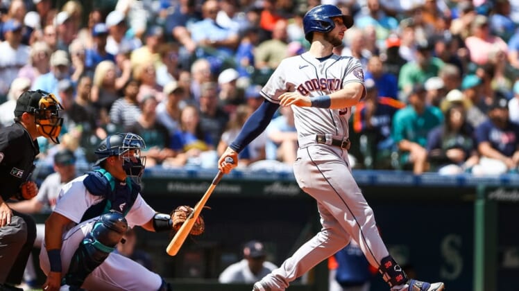 Jul 23, 2022; Seattle, Washington, USA;  Houston Astros right fielder Kyle Tucker (30) follows through on an RBI double against the Seattle Mariners during the fourth inning at T-Mobile Park. Mandatory Credit: Lindsey Wasson-USA TODAY Sports