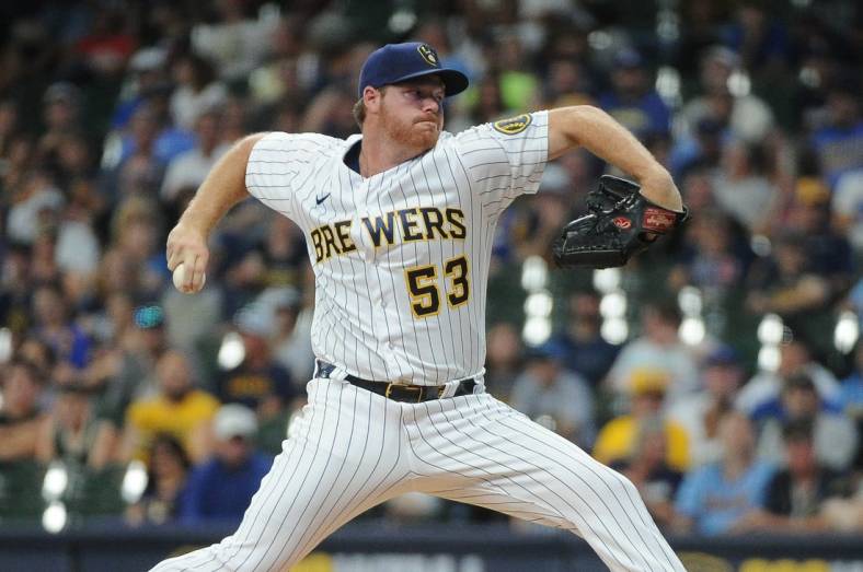 Jul 23, 2022; Milwaukee, Wisconsin, USA;  Milwaukee Brewers starting pitcher Brandon Woodruff (53) delivers against the Colorado Rockies in the first inning at American Family Field. Mandatory Credit: Michael McLoone-USA TODAY Sports