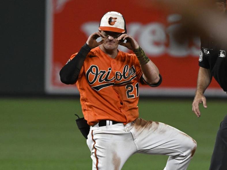 Jul 23, 2022; Baltimore, Maryland, USA;  Baltimore Orioles left fielder Austin Hays (21) reacts after hitting a double against the New York Yankees during the sixth inning at Oriole Park at Camden Yards. Mandatory Credit: James A. Pittman-USA TODAY Sports