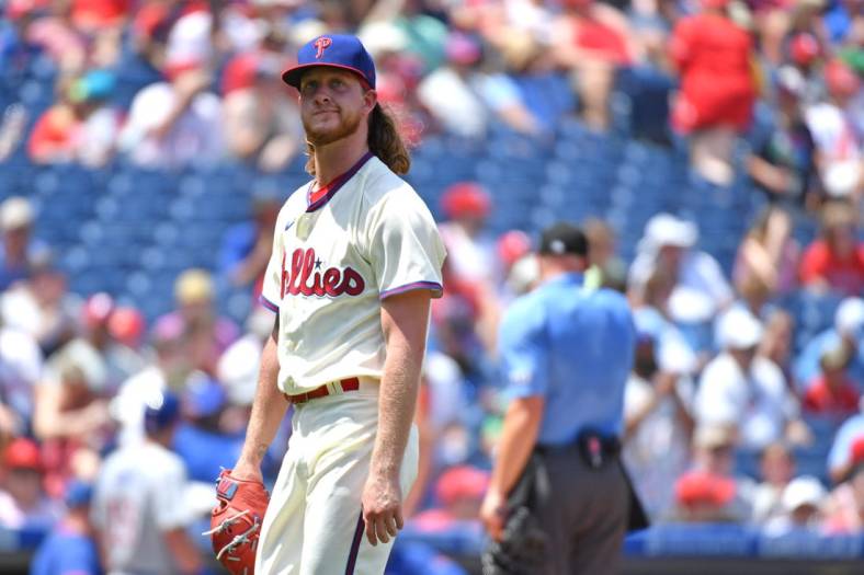 Jul 24, 2022; Philadelphia, Pennsylvania, USA; Philadelphia Phillies relief pitcher Baily Falter (70) reacts as he walks off the field against the Chicago Cubs during the third inning at Citizens Bank Park. Mandatory Credit: Eric Hartline-USA TODAY Sports