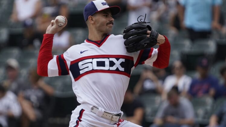 Jul 24, 2022; Chicago, Illinois, USA; Chicago White Sox starting pitcher Dylan Cease (84) throws the ball against Cleveland Guardians during the first inning at Guaranteed Rate Field. Mandatory Credit: David Banks-USA TODAY Sports