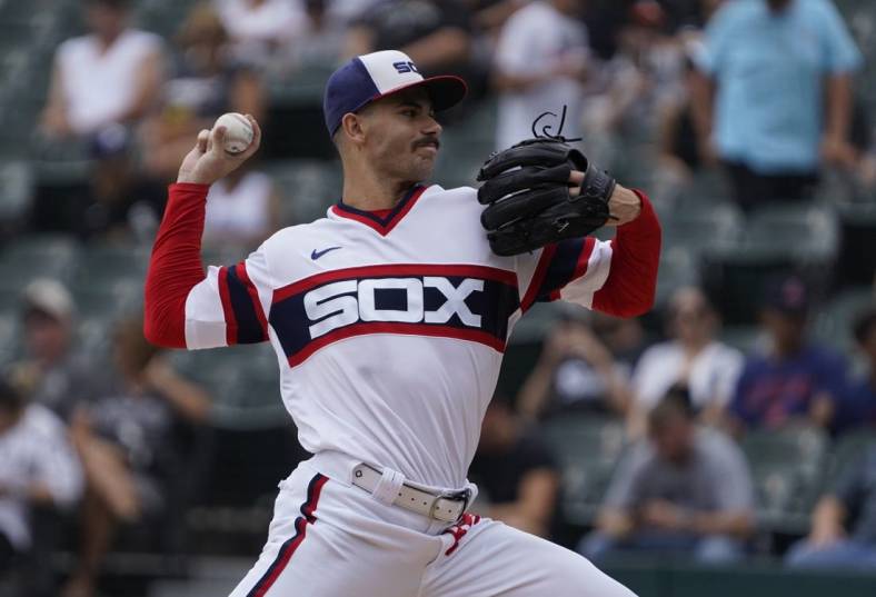 Jul 24, 2022; Chicago, Illinois, USA; Chicago White Sox starting pitcher Dylan Cease (84) throws the ball against Cleveland Guardians during the first inning at Guaranteed Rate Field. Mandatory Credit: David Banks-USA TODAY Sports
