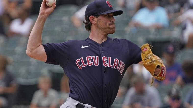 Jul 24, 2022; Chicago, Illinois, USA; Cleveland Guardians starting pitcher Shane Bieber (57) throws the ball against the Chicago White Sox during the first inning at Guaranteed Rate Field. Mandatory Credit: David Banks-USA TODAY Sports