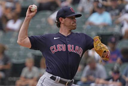 Jul 24, 2022; Chicago, Illinois, USA; Cleveland Guardians starting pitcher Shane Bieber (57) throws the ball against the Chicago White Sox during the first inning at Guaranteed Rate Field. Mandatory Credit: David Banks-USA TODAY Sports