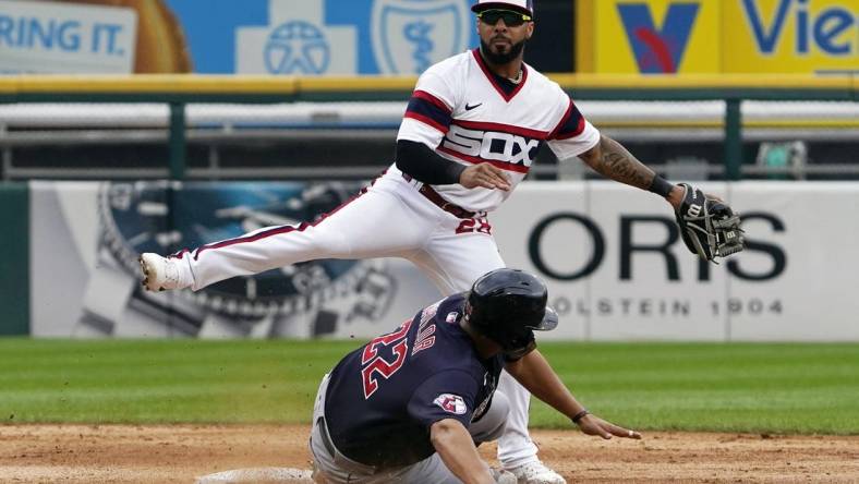 Jul 24, 2022; Chicago, Illinois, USA; Chicago White Sox second baseman Leury Garcia (28) forces out Cleveland Guardians designated hitter Josh Naylor (22) at second base then throws to first base to complete a double play during the third inning Guaranteed Rate Field. Mandatory Credit: David Banks-USA TODAY Sports