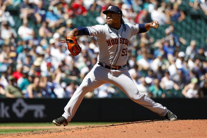 Jul 24, 2022; Seattle, Washington, USA; Houston Astros starting pitcher Framber Valdez (59) throws against the Seattle Mariners during the fourth inning at T-Mobile Park. Mandatory Credit: Joe Nicholson-USA TODAY Sports