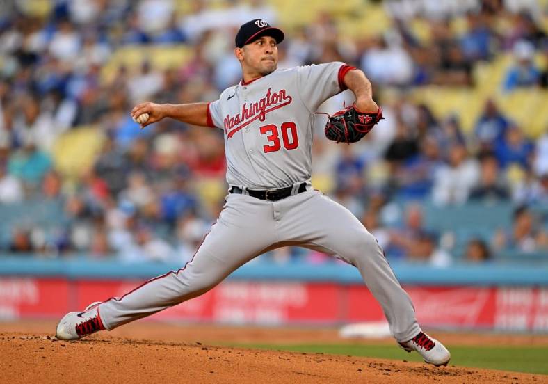 Jul 25, 2022; Los Angeles, California, USA; Washington Nationals starting pitcher Paolo Espino (30) throws a pitch in the first inning against the Los Angeles Dodgers at Dodger Stadium. Mandatory Credit: Jayne Kamin-Oncea-USA TODAY Sports