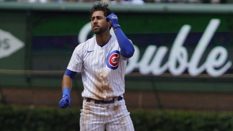 Jul 26, 2022; Chicago, Illinois, USA; Chicago Cubs first baseman Alfonso Rivas (36) gestures after a double during the fourth inning against the Pittsburgh Pirates at Wrigley Field. Mandatory Credit: David Banks-USA TODAY Sports