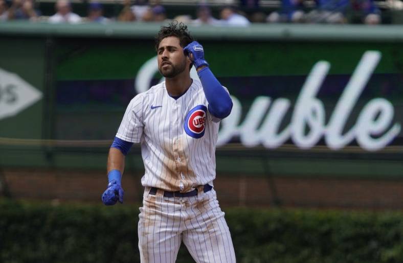 Jul 26, 2022; Chicago, Illinois, USA; Chicago Cubs first baseman Alfonso Rivas (36) gestures after a double during the fourth inning against the Pittsburgh Pirates at Wrigley Field. Mandatory Credit: David Banks-USA TODAY Sports