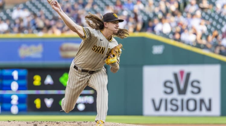 Jul 26, 2022; Detroit, Michigan, USA; San Diego Padres starting pitcher Mike Clevinger (52) pitches during the first inning against the Detroit Tigers at Comerica Park. Mandatory Credit: Raj Mehta-USA TODAY Sports