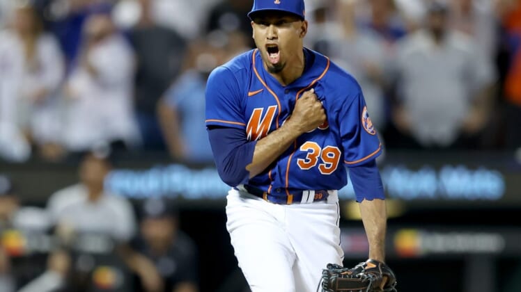 Jul 26, 2022; New York City, New York, USA; New York Mets relief pitcher Edwin Diaz (39) reacts after getting the last out during the ninth inning against the New York Yankees at Citi Field. Mandatory Credit: Brad Penner-USA TODAY Sports