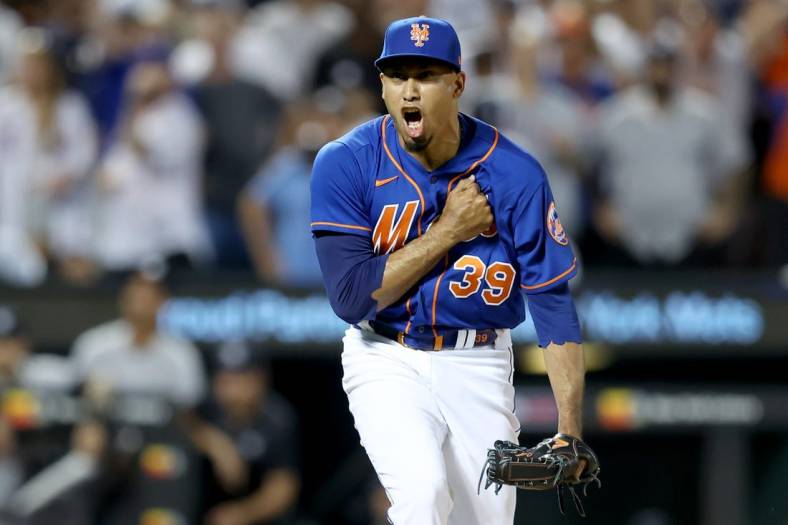 Jul 26, 2022; New York City, New York, USA; New York Mets relief pitcher Edwin Diaz (39) reacts after getting the last out during the ninth inning against the New York Yankees at Citi Field. Mandatory Credit: Brad Penner-USA TODAY Sports