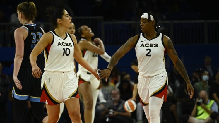 Jul 26, 2022; Chicago, IL, USA;  Las Vegas Aces guard Kelsey Plum (10) and Las Vegas Aces guard Riquna Williams (2) high five against the Chicago Sky during the second half of the Commissioners Cup-Championships at Wintrust Arena. Mandatory Credit: Matt Marton-USA TODAY Sports