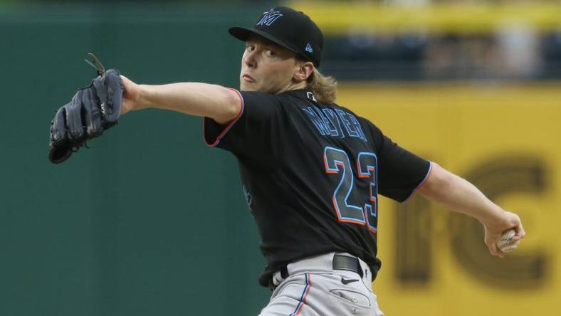 Jul 23, 2022; Pittsburgh, Pennsylvania, USA; Miami Marlins starting pitcher Max Meyer (23) delivers a pitch against the Pittsburgh Pirates during the first inning at PNC Park. Mandatory Credit: Charles LeClaire-USA TODAY Sports