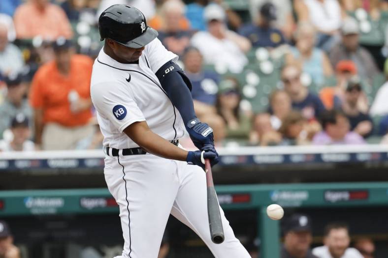 Jul 27, 2022; Detroit, Michigan, USA; Detroit Tigers second baseman Jonathan Schoop (7) hits a single in the fifth inning against the San Diego Padres at Comerica Park. Mandatory Credit: Rick Osentoski-USA TODAY Sports