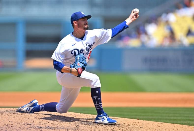 Jul 27, 2022; Los Angeles, California, USA; Los Angeles Dodgers starting pitcher Andrew Heaney (28) throws to the plate in the fourth inning against the Washington Nationals at Dodger Stadium. Mandatory Credit: Jayne Kamin-Oncea-USA TODAY Sports