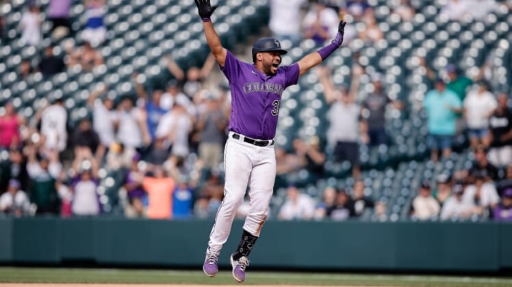 Jul 27, 2022; Denver, Colorado, USA; Colorado Rockies catcher Elias Diaz (35) reacts after hitting a walk-off two RBI single in the ninth inning against the Chicago White Sox at Coors Field. Mandatory Credit: Isaiah J. Downing-USA TODAY Sports