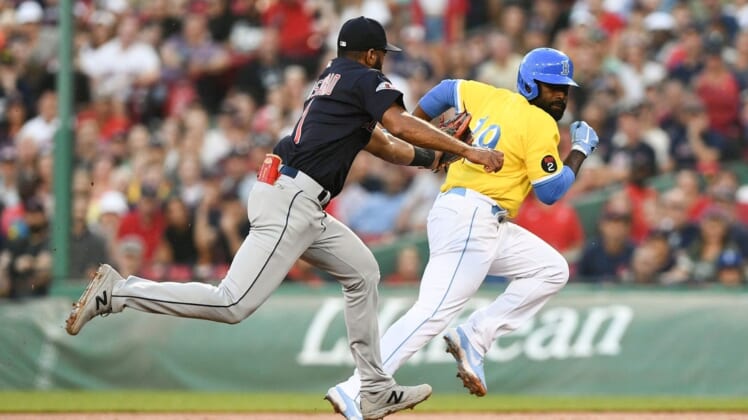 Jul 27, 2022; Boston, Massachusetts, USA; Cleveland Guardians shortstop Amed Rosario (1) tags out Boston Red Sox right fielder Jackie Bradley Jr. (19) during the second inning at Fenway Park. Mandatory Credit: Brian Fluharty-USA TODAY Sports