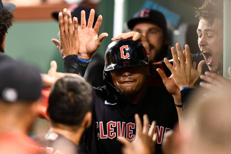 Jul 27, 2022; Boston, Massachusetts, USA; Cleveland Guardians first baseman Josh Naylor (22) celebrates with teammates after hitting a solo home run against the Boston Red Sox during the ninth inning at Fenway Park. Mandatory Credit: Brian Fluharty-USA TODAY Sports