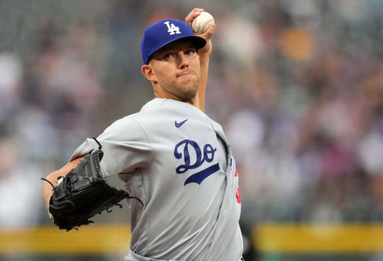 Jul 28, 2022; Denver, Colorado, USA; Los Angeles Dodgers starting pitcher Tyler Anderson (31) delivers a pitch in the first inning against the Colorado Rockies at Coors Field. Mandatory Credit: Ron Chenoy-USA TODAY Sports