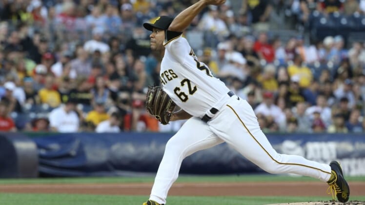 Jul 29, 2022; Pittsburgh, Pennsylvania, USA;  Pittsburgh Pirates starting pitcher Jose Quintana (62) delivers a pitch against the Philadelphia Phillies during the first inning at PNC Park. Mandatory Credit: Charles LeClaire-USA TODAY Sports