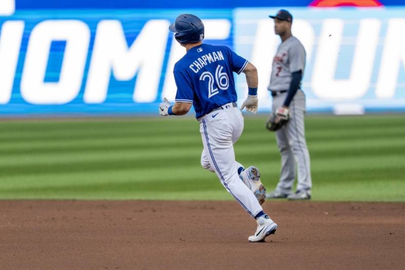 Jul 29, 2022; Toronto, Ontario, CAN; Toronto Blue Jays third baseman Matt Chapman (26) hits a home run against the Detroit Tigers during the second inning at Rogers Centre. Mandatory Credit: Kevin Sousa-USA TODAY Sports