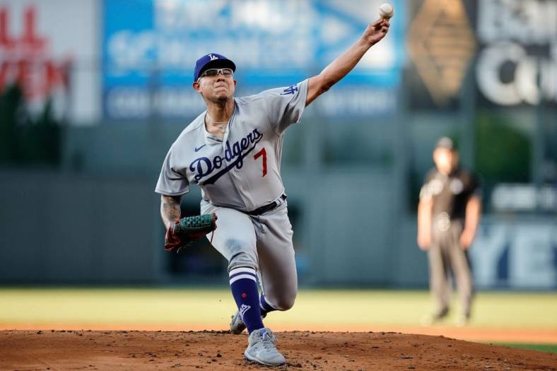 Jul 29, 2022; Denver, Colorado, USA; Los Angeles Dodgers starting pitcher Julio Urias (7) pitches in the first inning against the Colorado Rockies at Coors Field. Mandatory Credit: Isaiah J. Downing-USA TODAY Sports