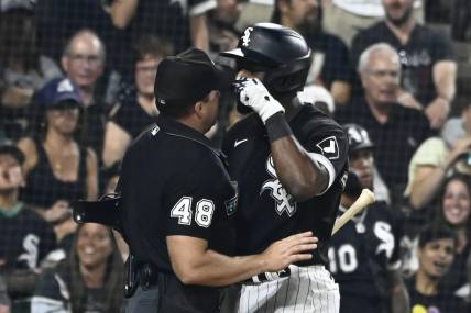Jul 29, 2022; Chicago, Illinois, USA;  Umpire Nick Mahrley (48) and Chicago White Sox shortstop Tim Anderson (7) have an altercation during the seventh inning of the teams game against the Oakland Athletics at Guaranteed Rate Field. Mandatory Credit: Matt Marton-USA TODAY Sports